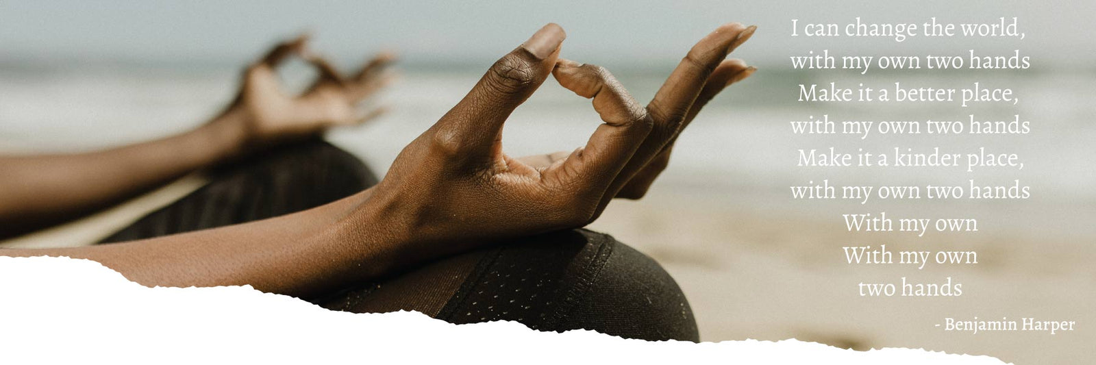 Woman performing yoga, hands held together, text overlay reads 'I can change the world, with my own two hands. Make it a better place with my own two hands. Make it a kinder place, with my own two hands. With my own, with my own two hands - By Benjamin Harper'. 