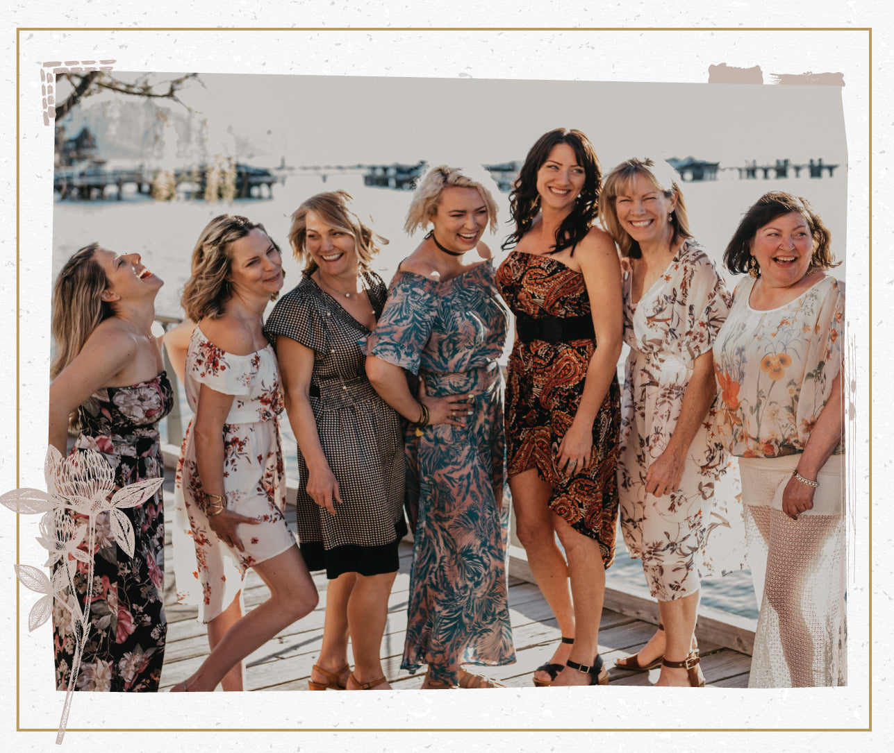 Seven women standing in a line dressed in boho attire with a decorative frame and a flower graphic.