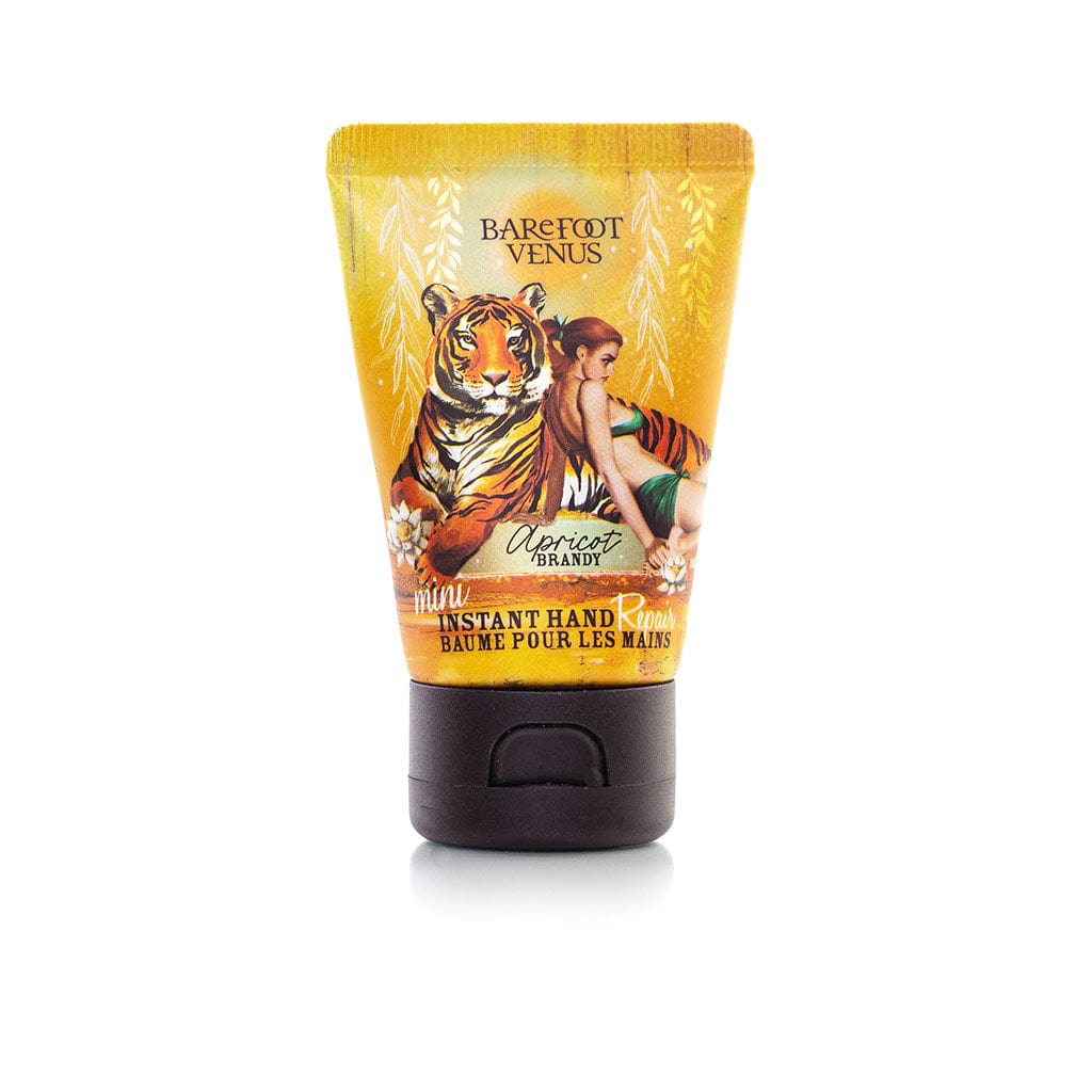 A tube of Apricot Brandy instant hand repair mini with a label featuring illustrations of a tiger and woman.